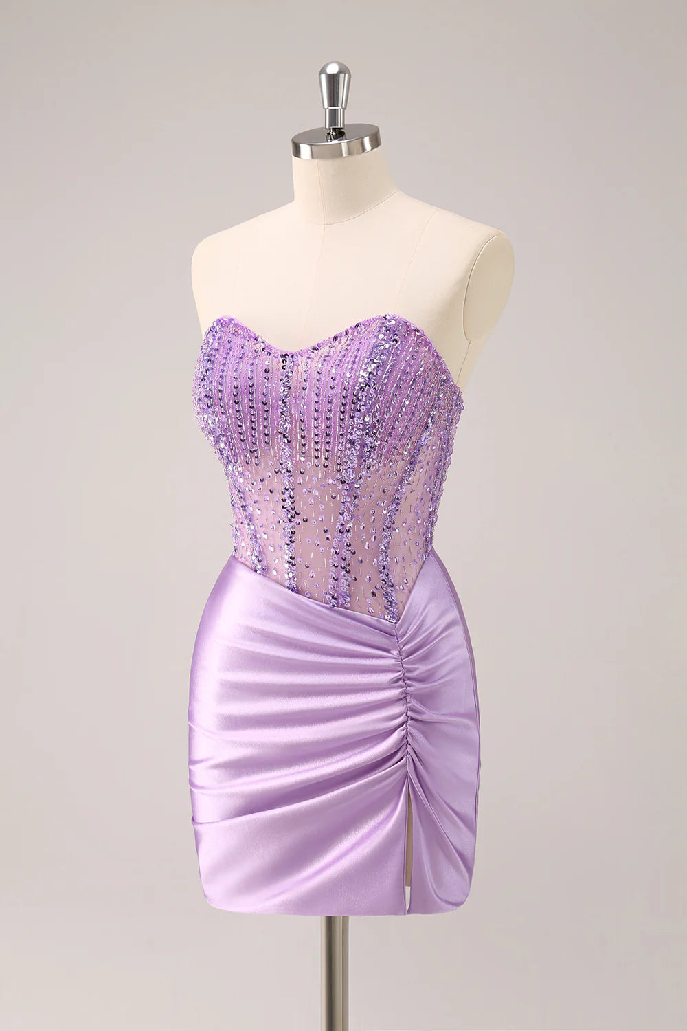 Sparkly lilac bodycon strapless homecoming dress with sequins and beading.