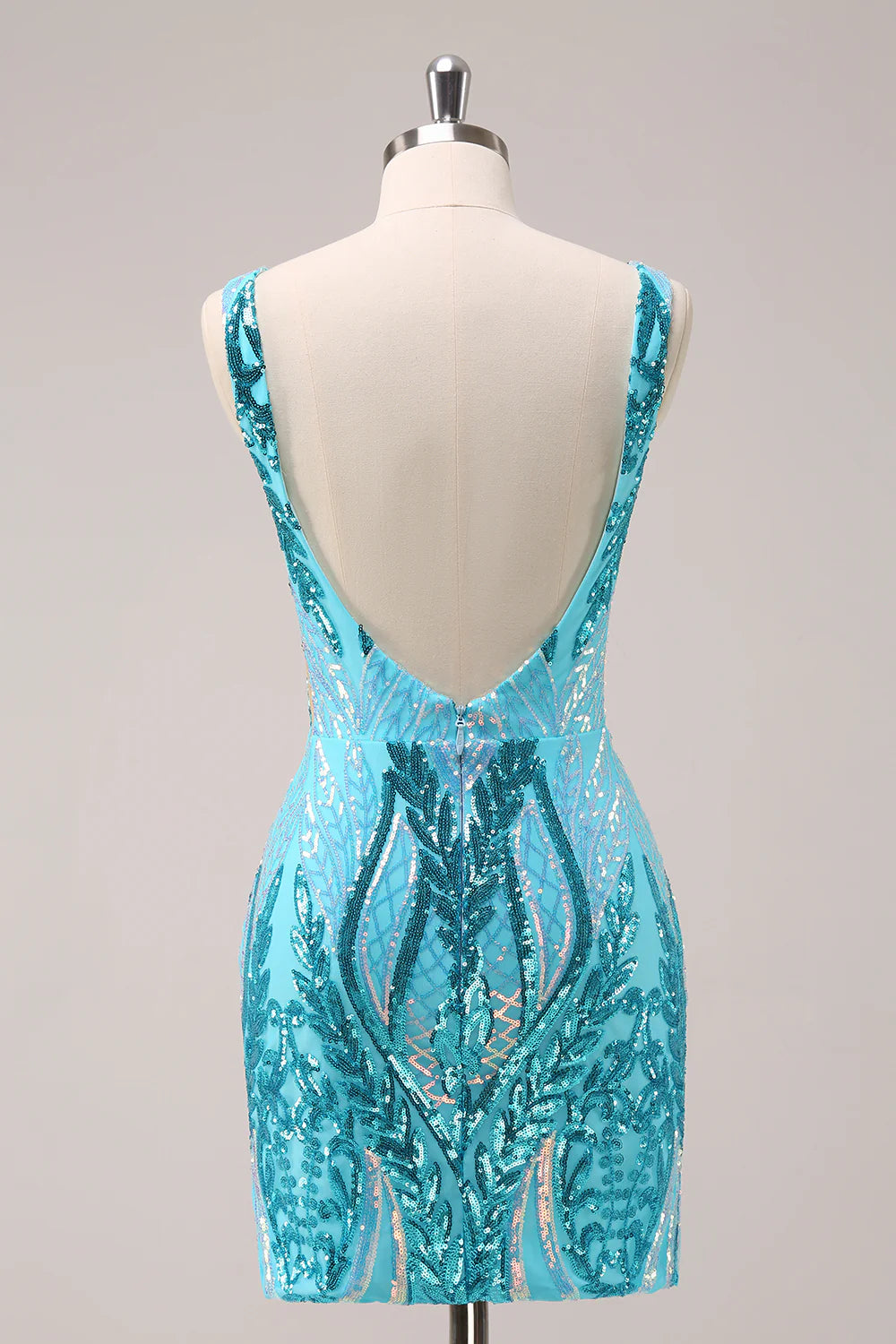 Backless sparkly blue bodycon dress with sequin detail, side view.