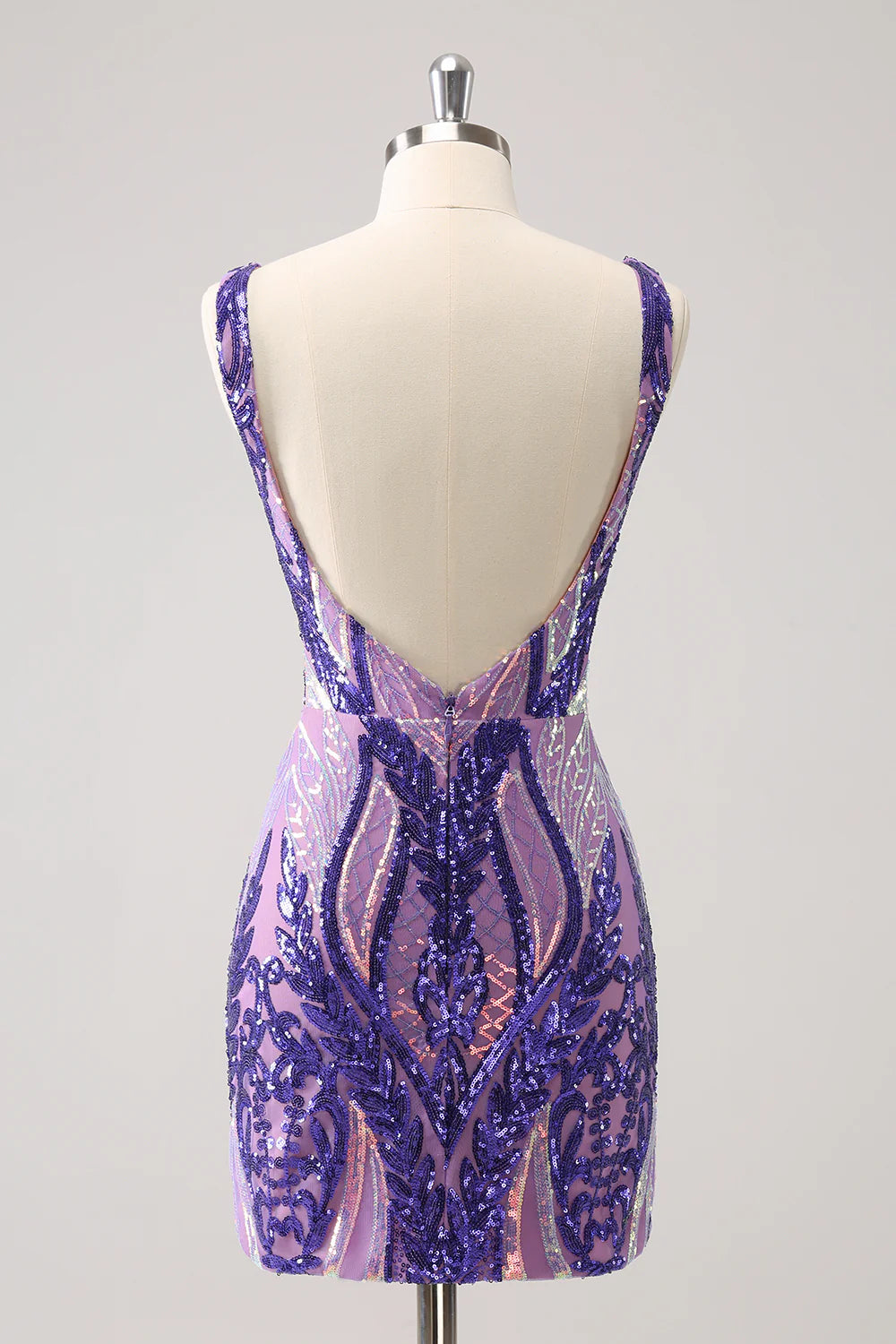 Back view of a dark purple sequined bodycon dress, showing the backless design.