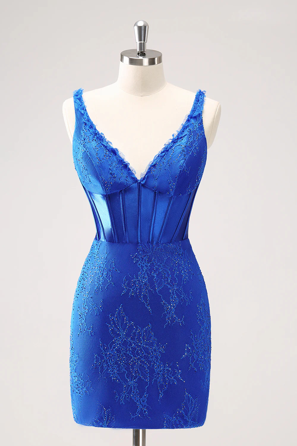 Sparkly royal blue bodycon homecoming dress with V-neck and beaded corset.