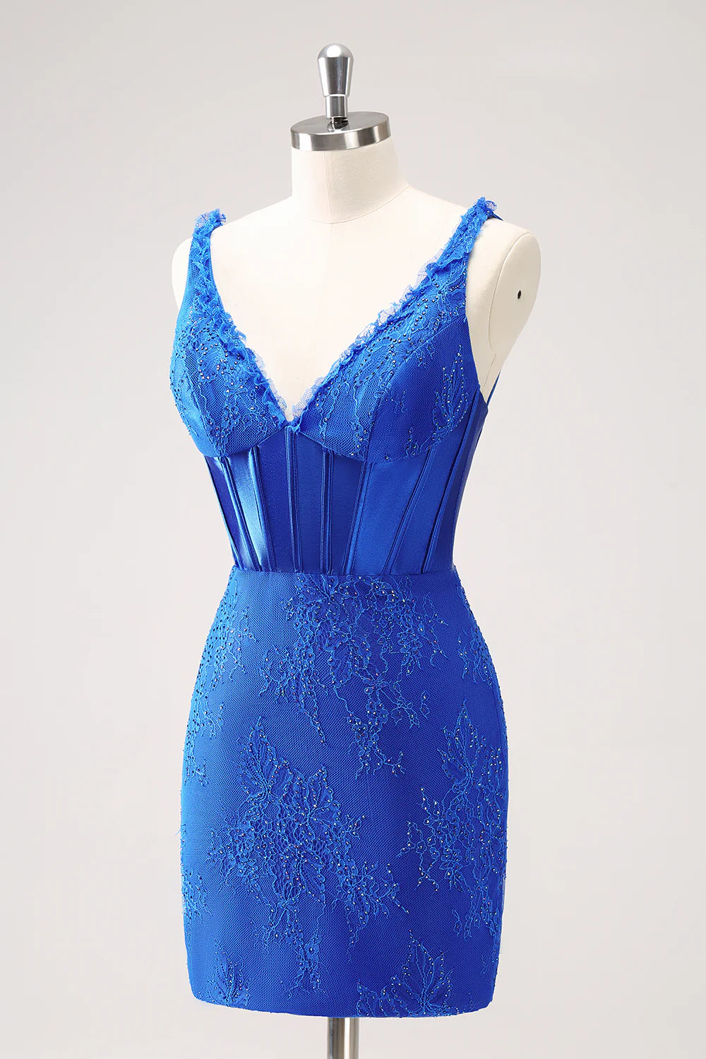 Side view of sparkly royal blue bodycon dress with V-neck and ruched details.