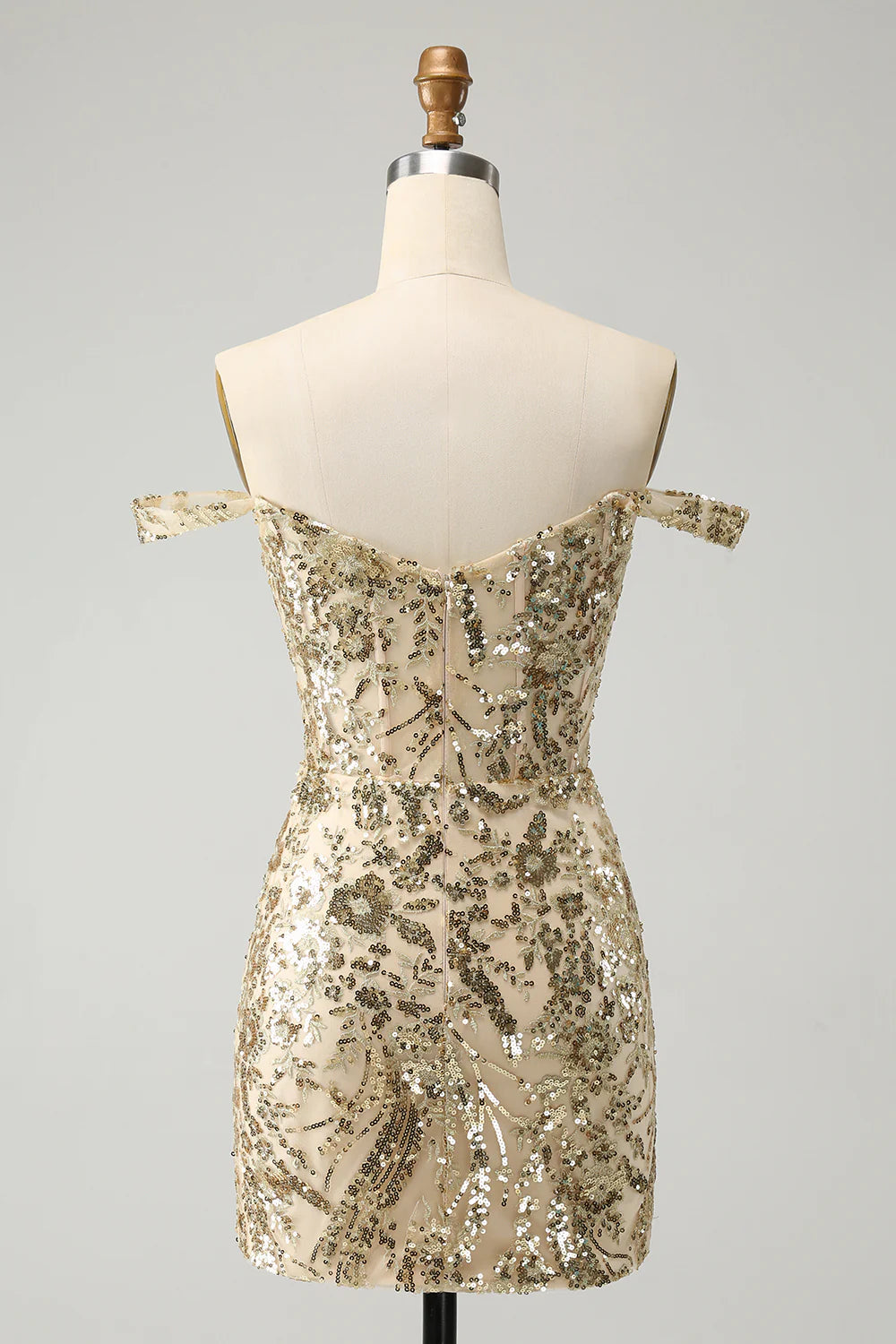 Side view of the golden sequin off-shoulder bodycon dress.