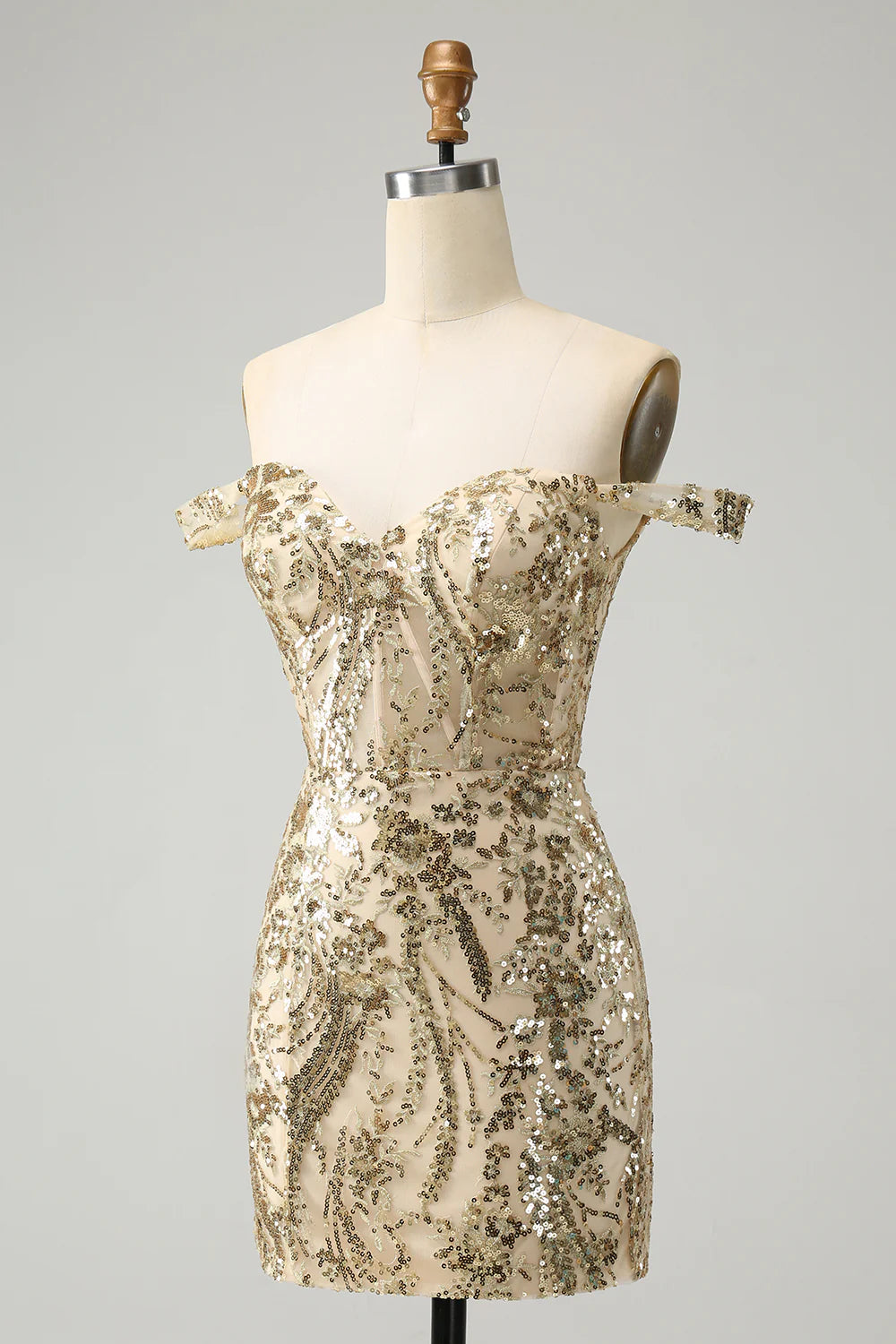 Close-up of the corset and sequin details on the golden homecoming dress.