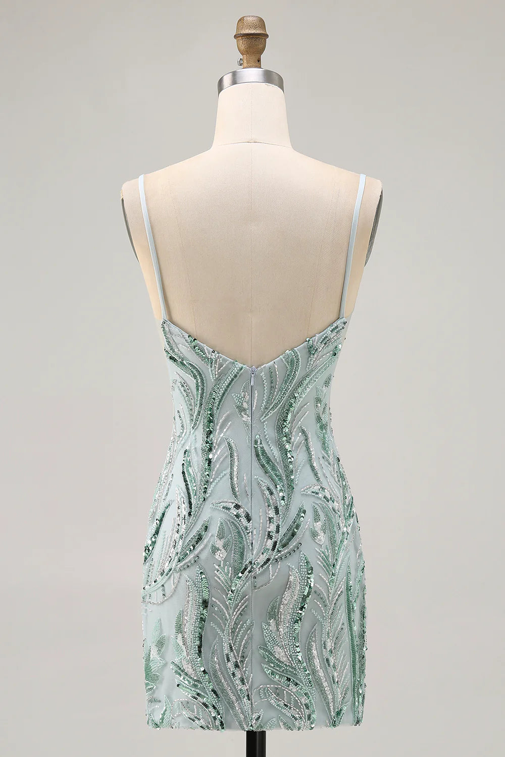 Back view of a sparkly green bodycon short homecoming dress with sequins and beading.