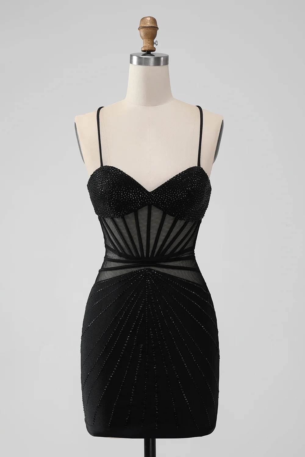 Sparkly black mermaid homecoming dress with lace-up back and beading.