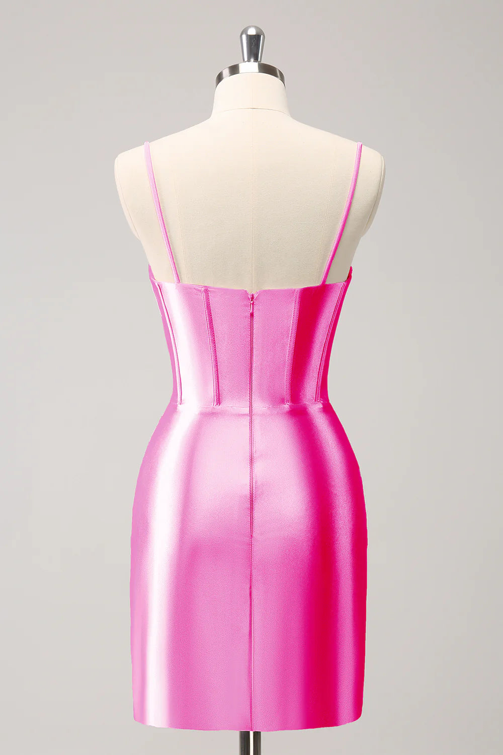 Side view of fuchsia pleated short homecoming dress.