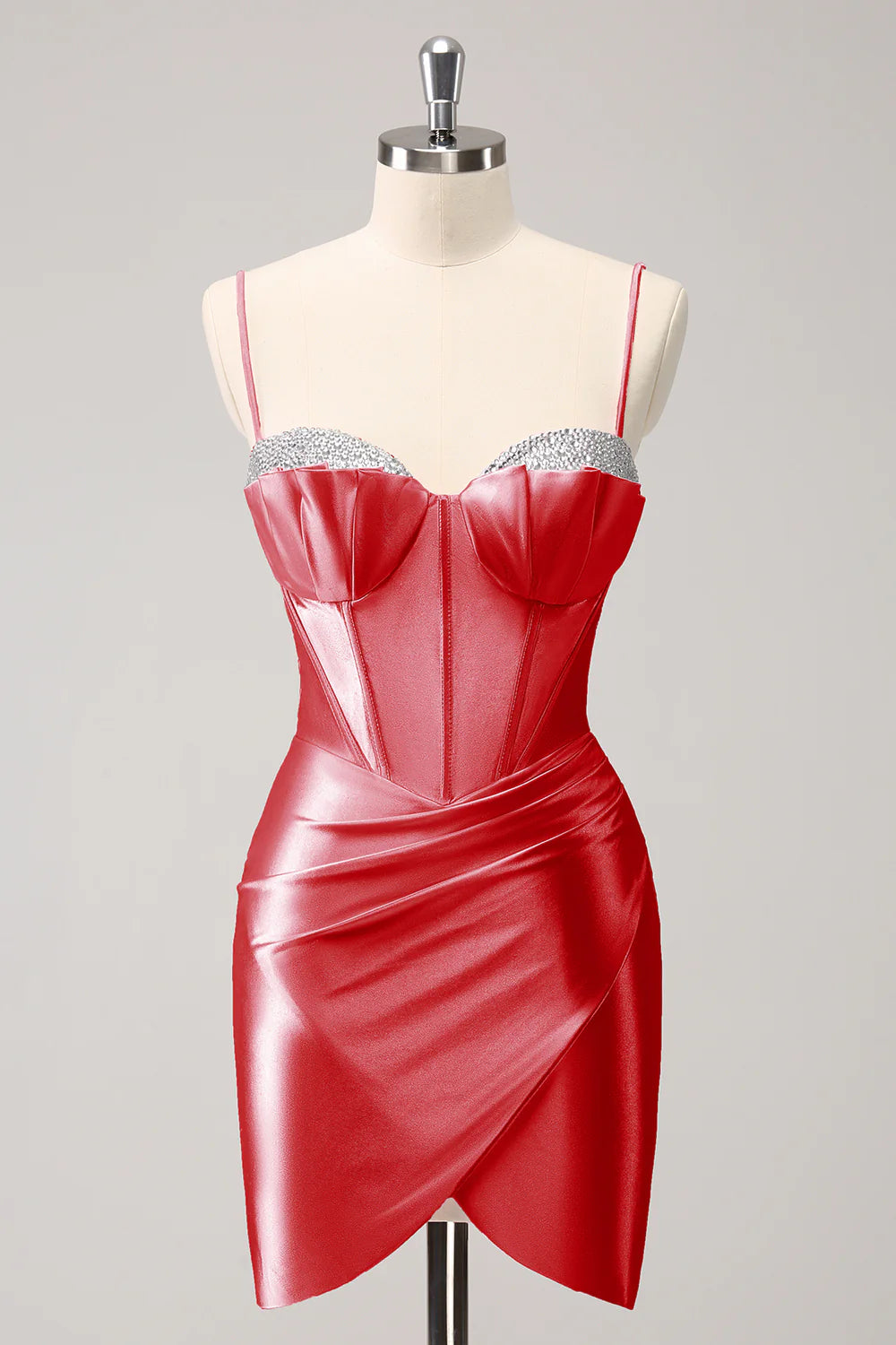 Red sparkly short homecoming dress with V-neck and spaghetti straps.