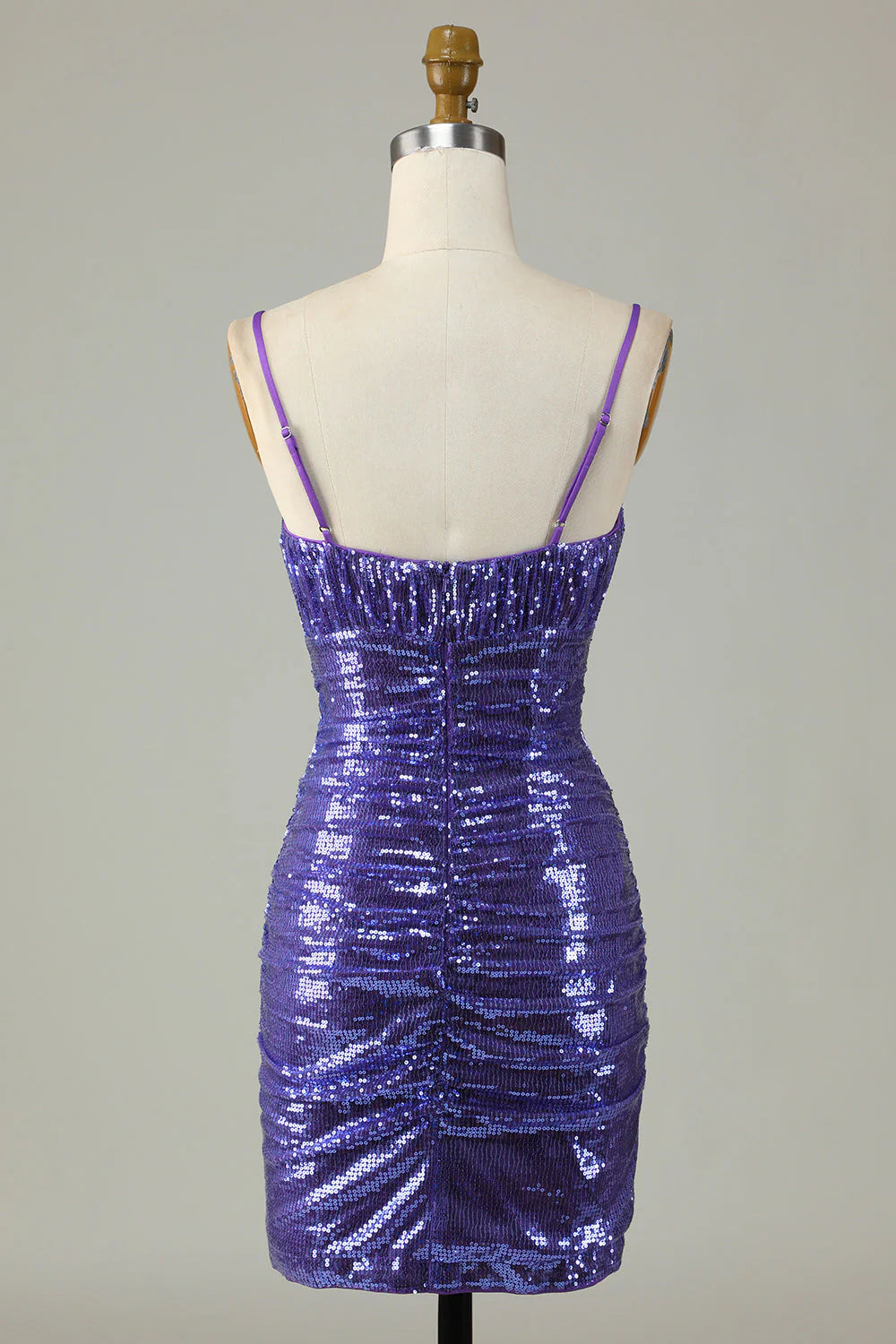 Side view of the purple sequin spaghetti strap dress.