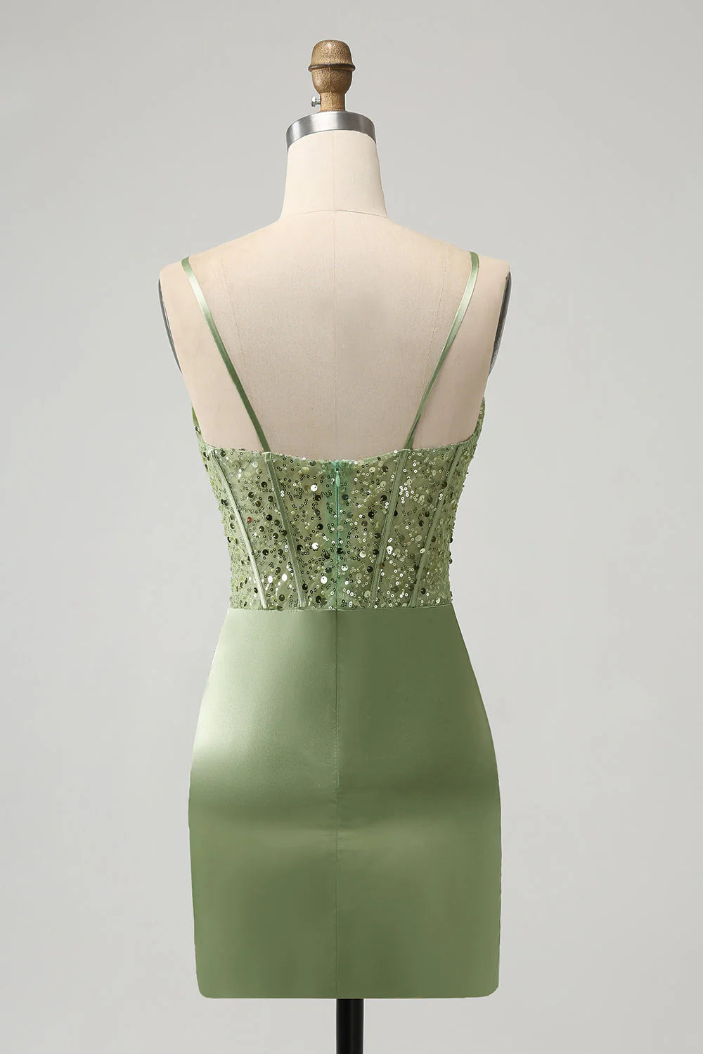 Side view of sage green sequin homecoming dress with sweetheart neckline.