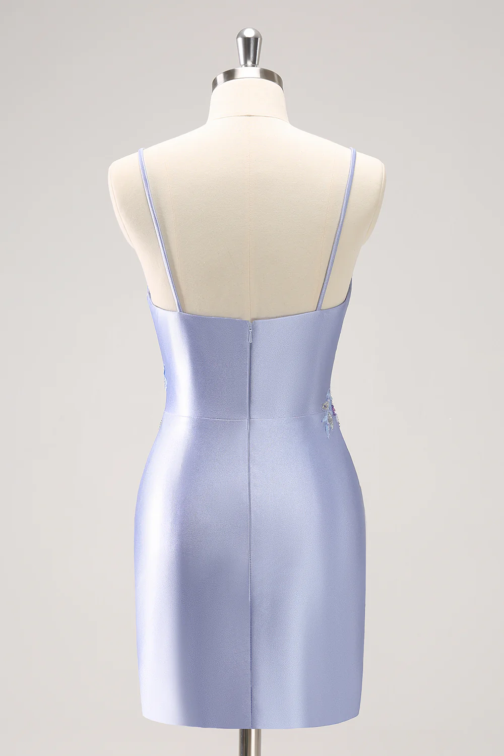 Side view of the blue sequin dress, highlighting the fitted corset bodice and ankle-length skirt.