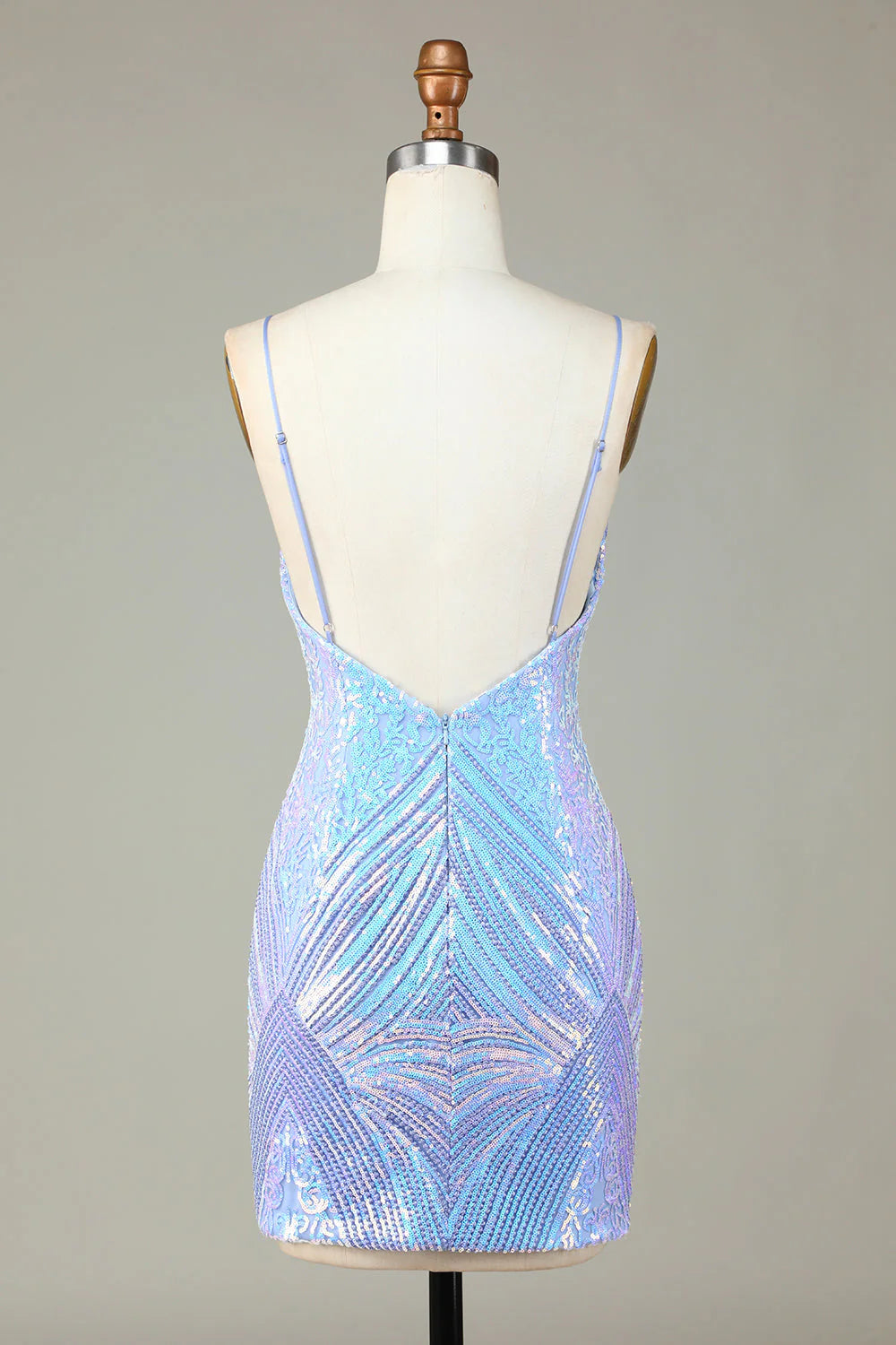 Close-up of the back of the blue sequin homecoming dress, showing spaghetti straps and open back.