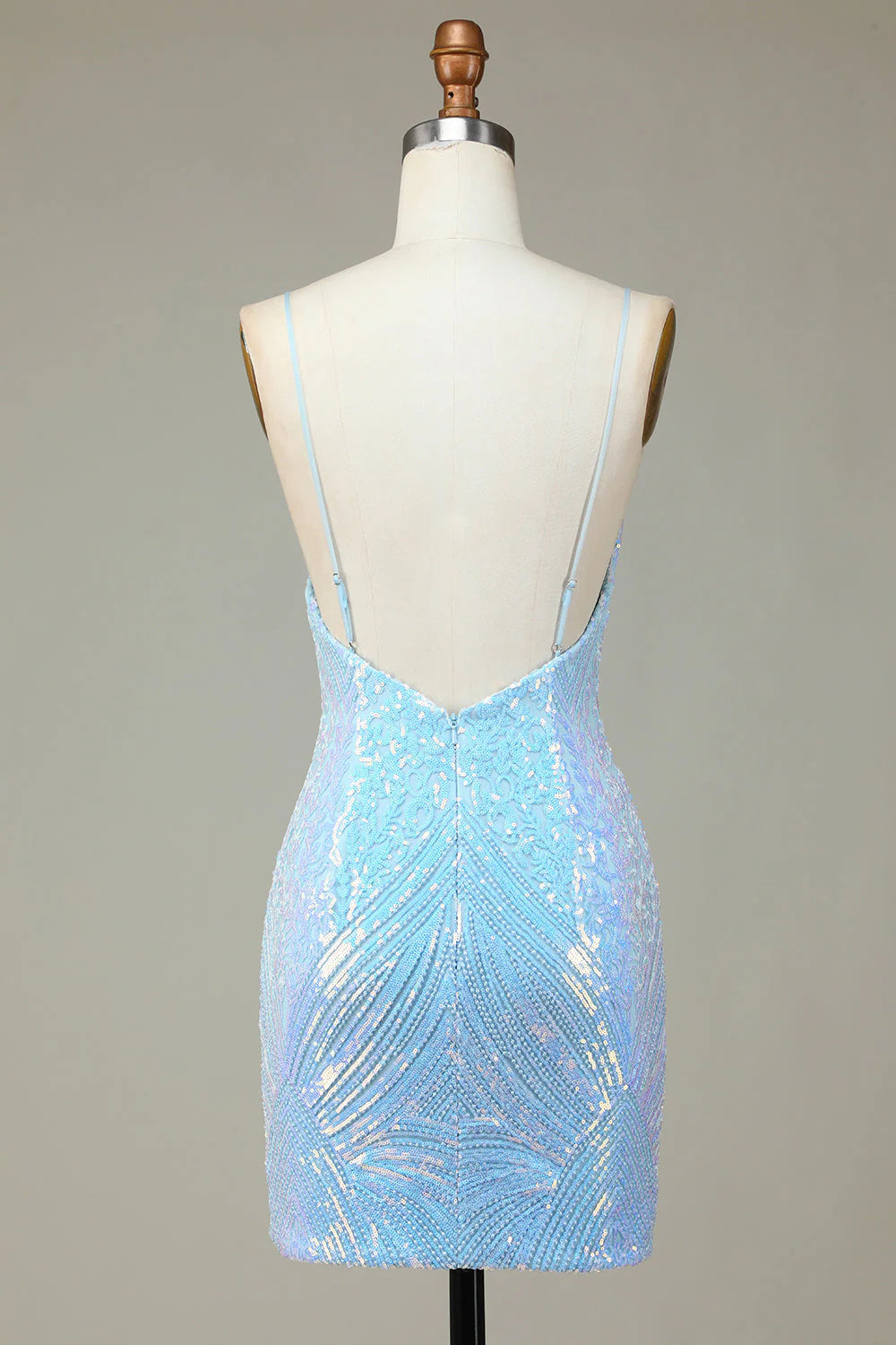 Detail shot of the blue sequin fabric on the short homecoming dress.