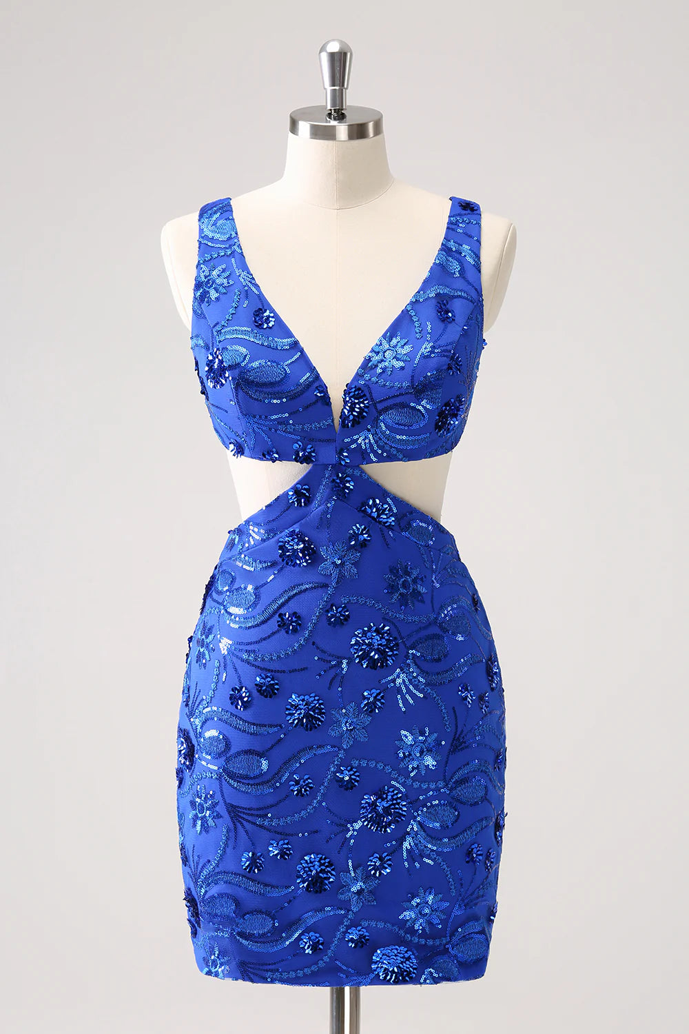 Model wearing a sparkly royal blue sequin short homecoming dress with a lace-up back.