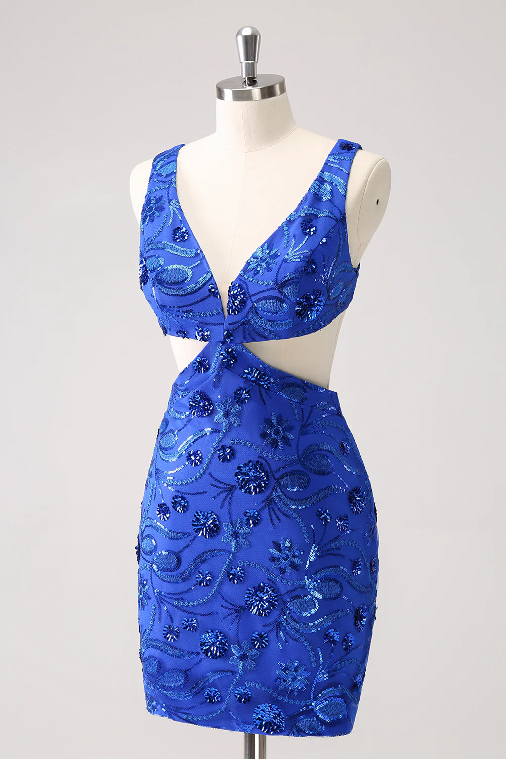 Side view of the sparkly royal blue short dress, showing sequin detail and hollow-out design.