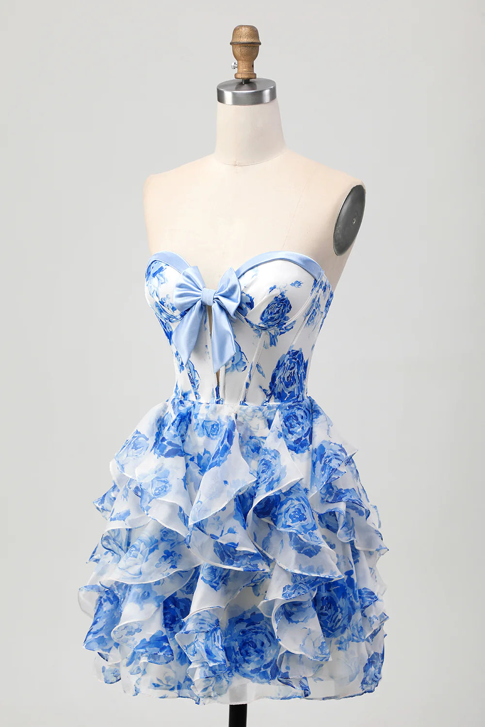 Back view of the elegant white and blue floral strapless A-line dress.