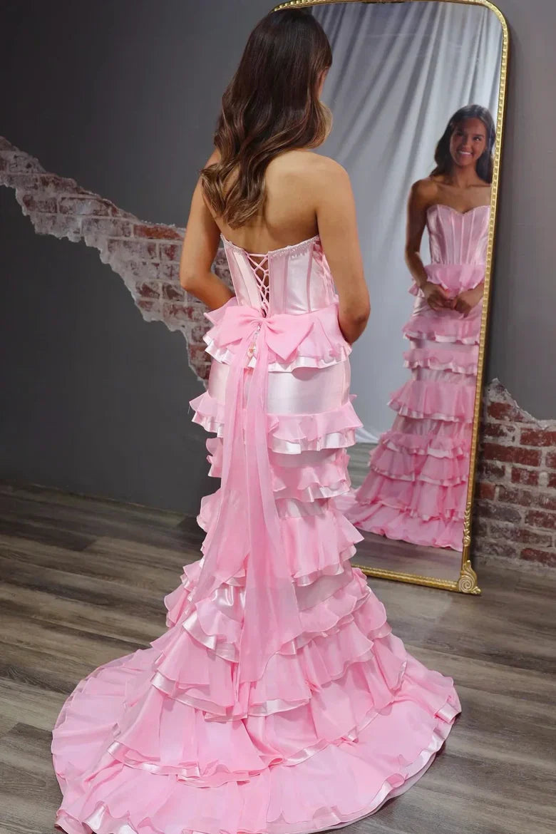 Strapless Pink Ruffled Mermaid Prom Dress with Corset Back and Bow Train for Formal Occasions