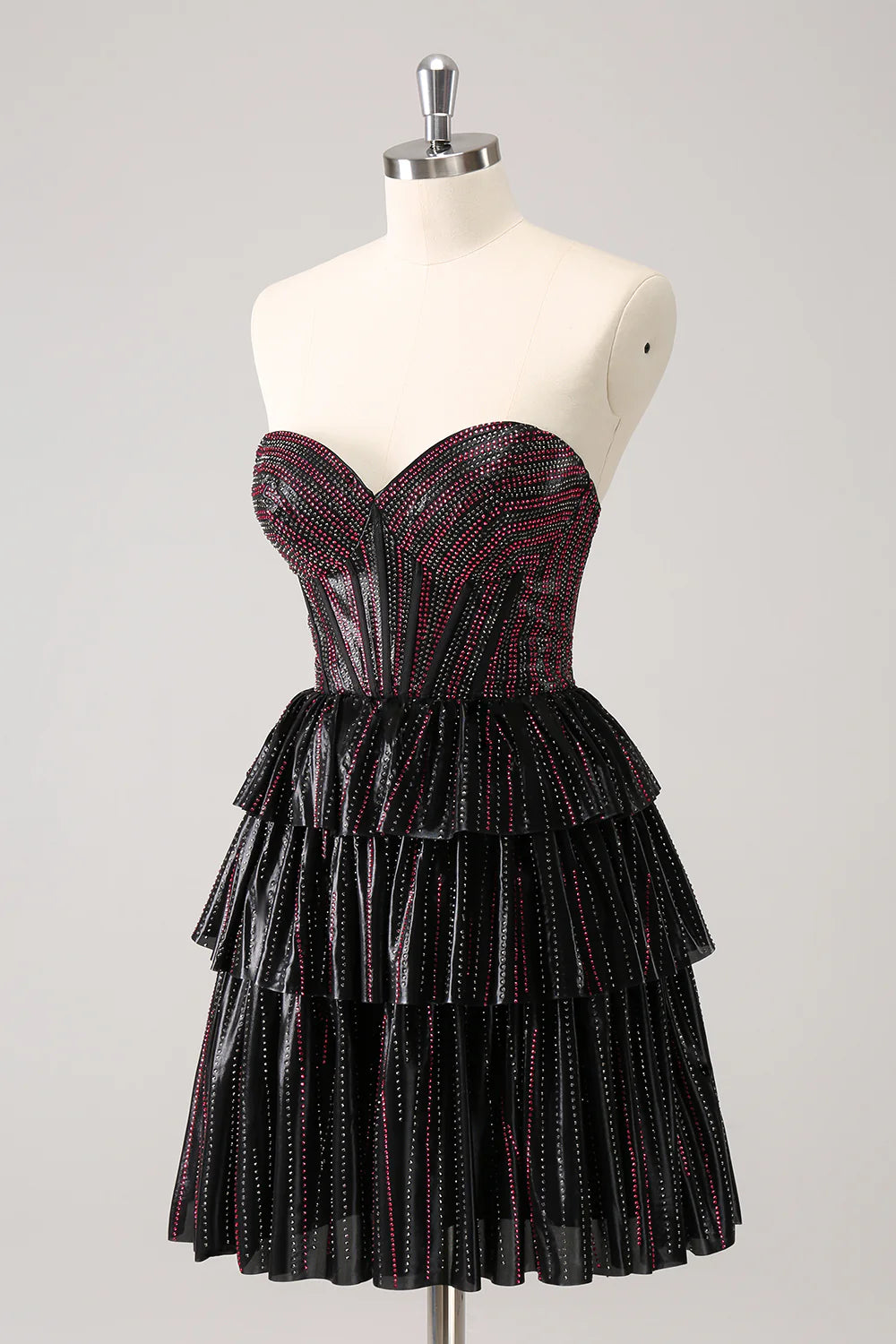 Back view of the black and pink A-line sweetheart corset homecoming dress.