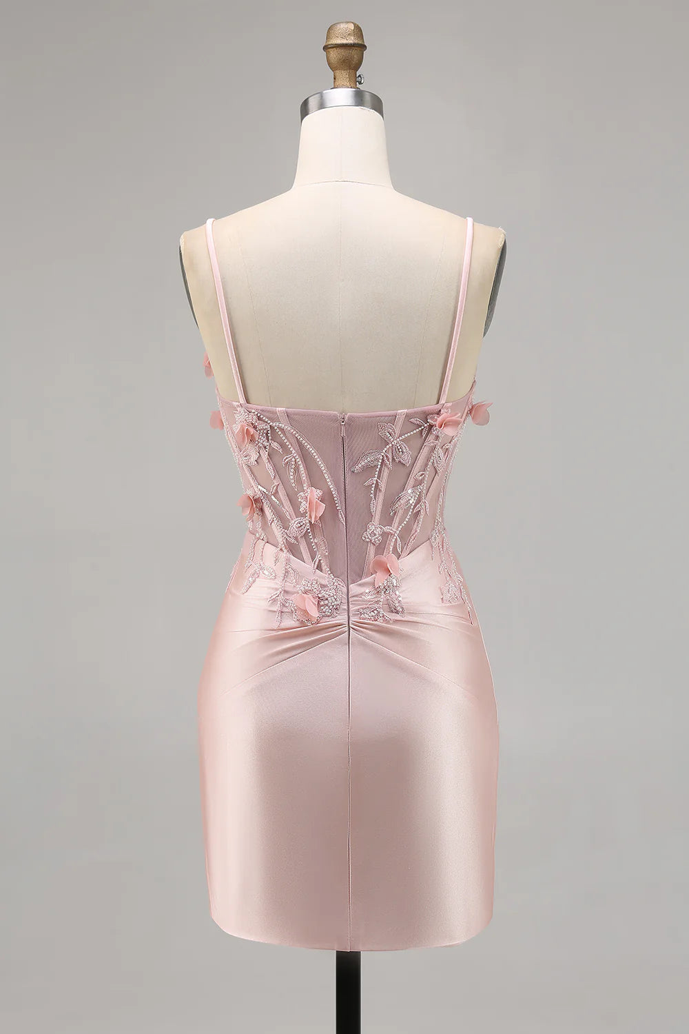 Side view of pink satin beaded bodycon dress.