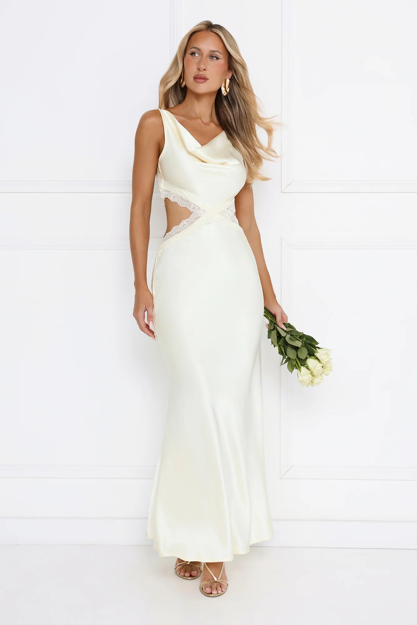 Stunning Cream Satin Mermaid Maxi Dress with Cowl Neckline, Delicate Lace Trim Cutout Details, Open Back Double Tie Accent and Flowy Floor-Length Skirt