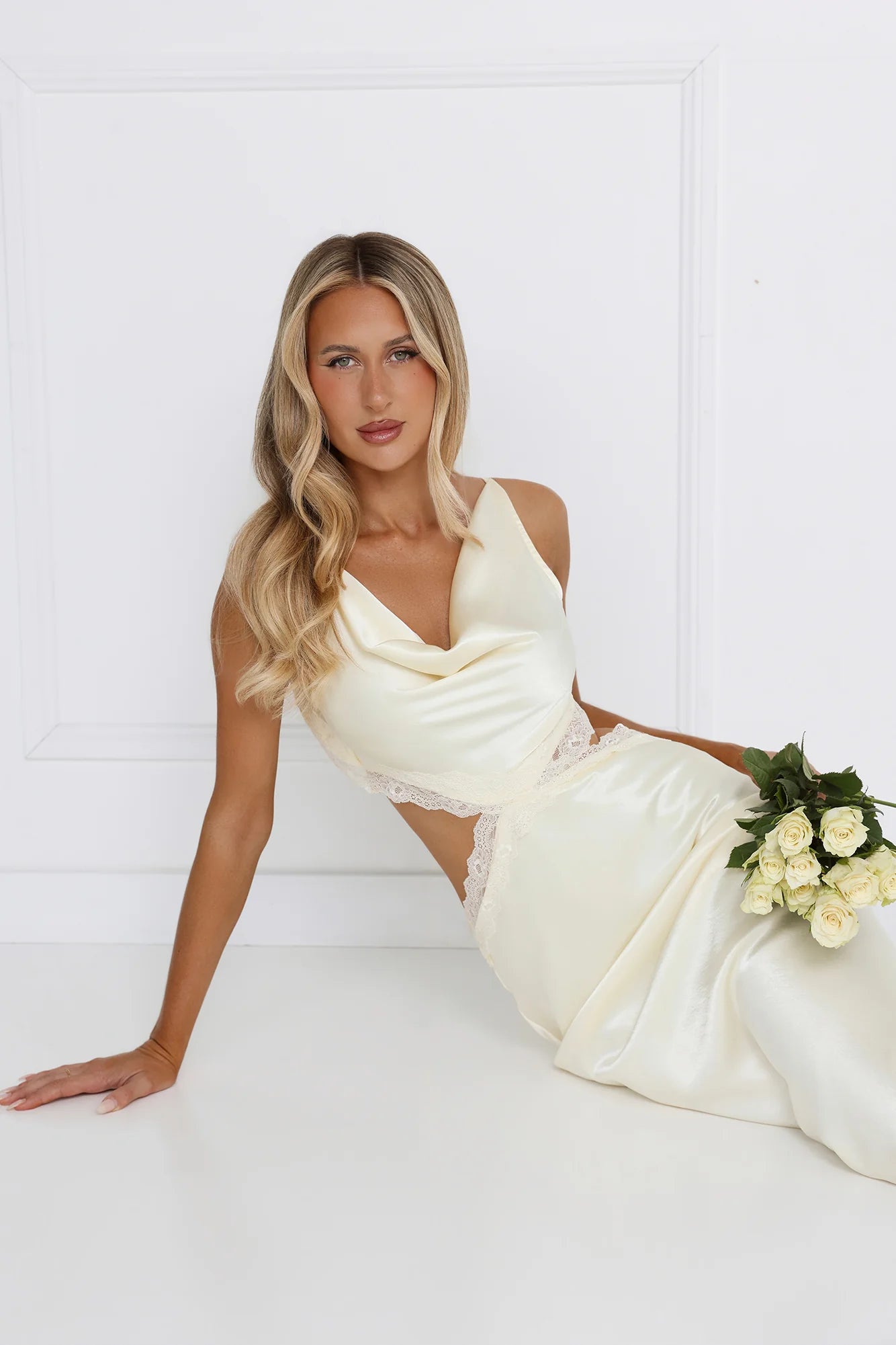 Stunning Cream Satin Mermaid Maxi Dress with Cowl Neckline, Delicate Lace Trim Cutout Details, Open Back Double Tie Accent and Flowy Floor-Length Skirt