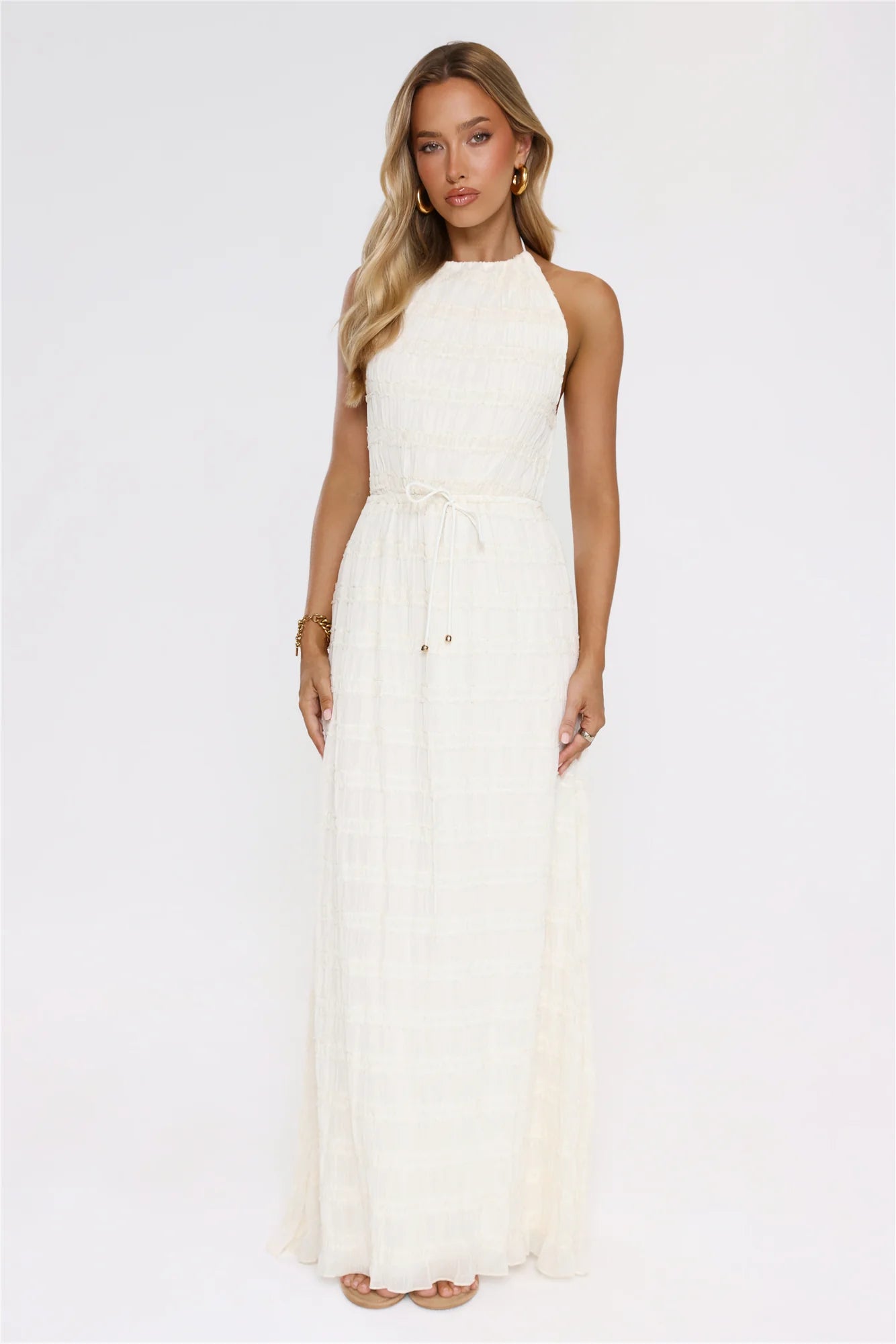 Stunning Cream Textured Halter Maxi Dress with Open Back Double Tie Detail, Waist Drawstring Accent, Smocked Bodice and Flowy Ruffled Maxi Skirt