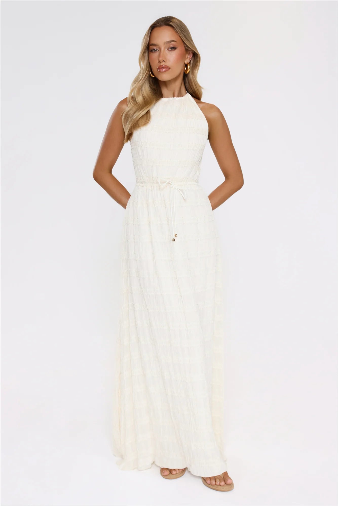 Stunning Cream Textured Halter Maxi Dress with Open Back Double Tie Detail, Waist Drawstring Accent, Smocked Bodice and Flowy Ruffled Maxi Skirt