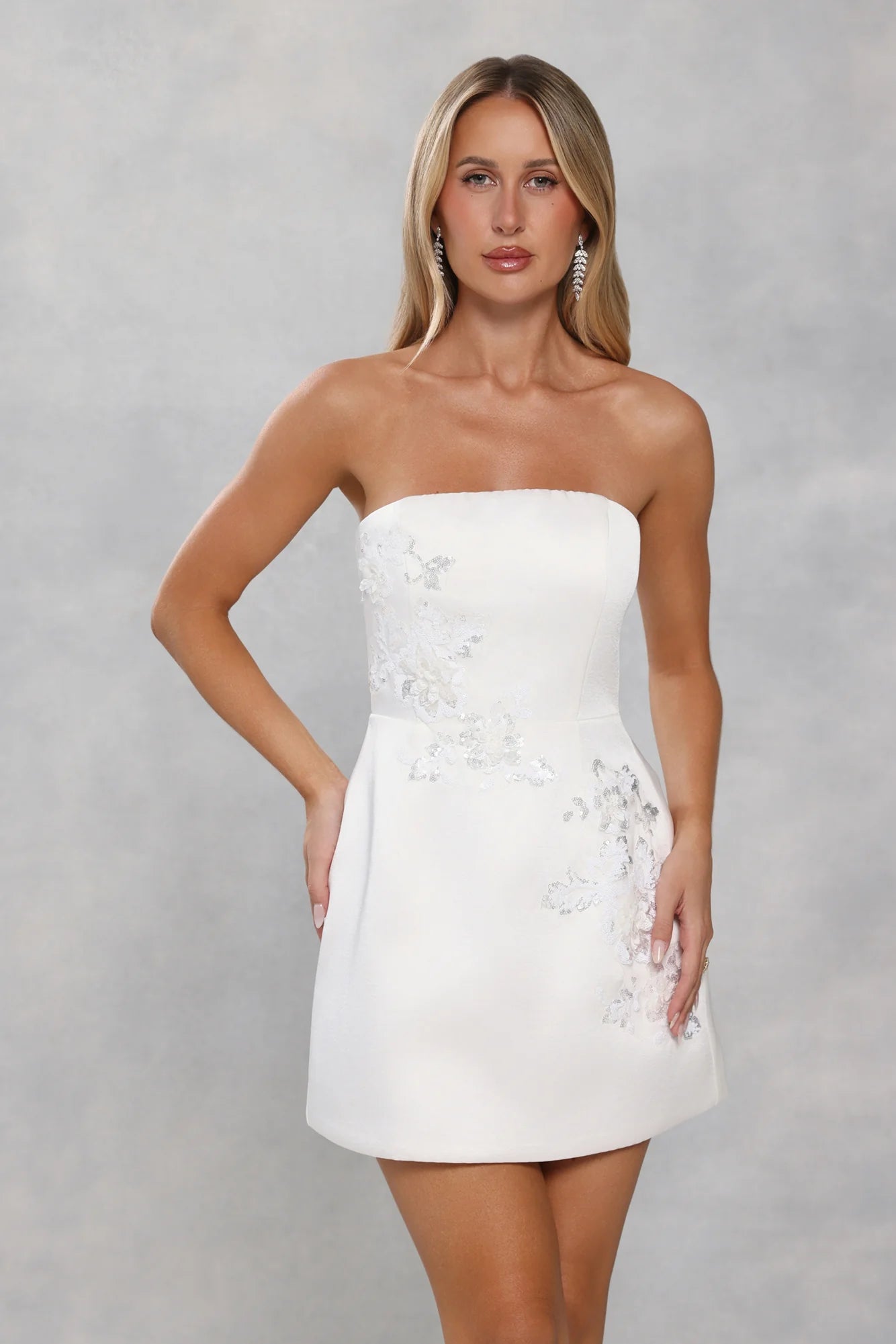 Stunning White Strapless Mini Dress with 3D Floral Sequin Appliqué, Structured Bodice, Flared Skater Skirt and Open Back Zipper Closure