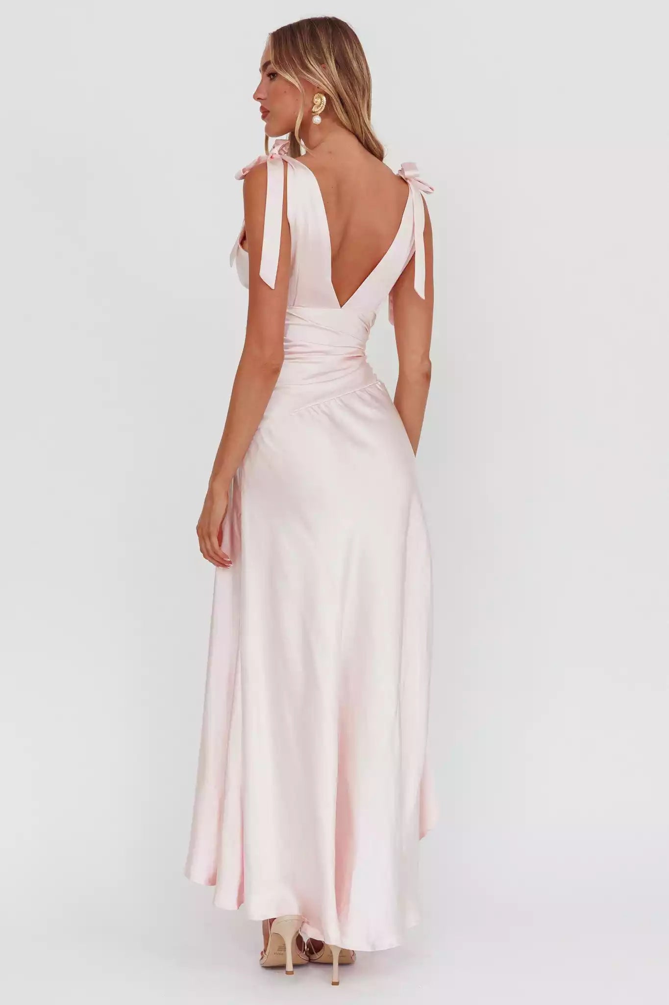 Stunning high and low hems with shoulder straps and a cinched waist design featuring zippers on the sides Prom Dresses