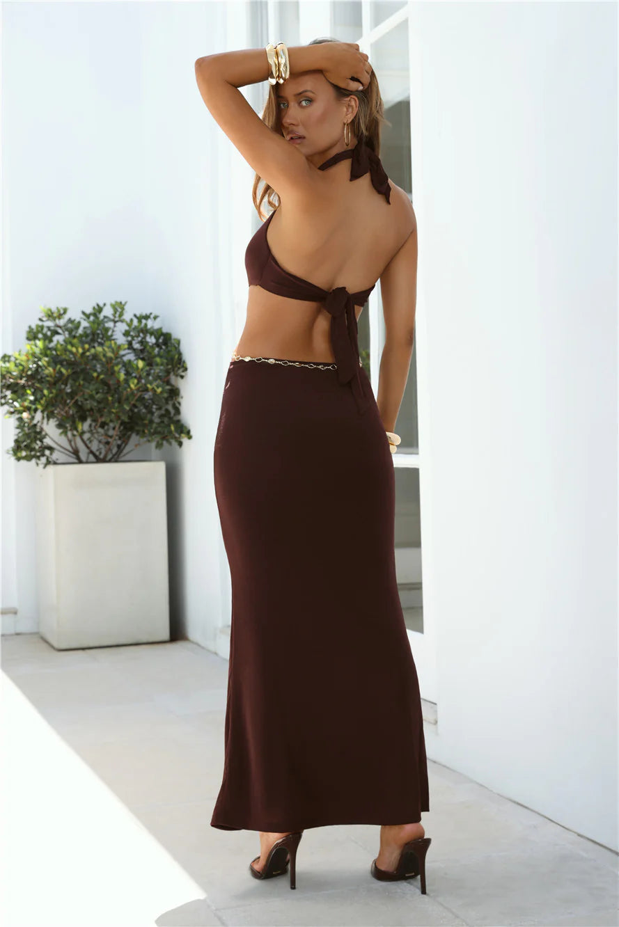 Sultry Chocolate Brown Halter Maxi Dress with Deep Plunge V-Neck, Gold Chain Cutout Waist, Back Tie Closure and Form-Fitting Mermaid Silhouette