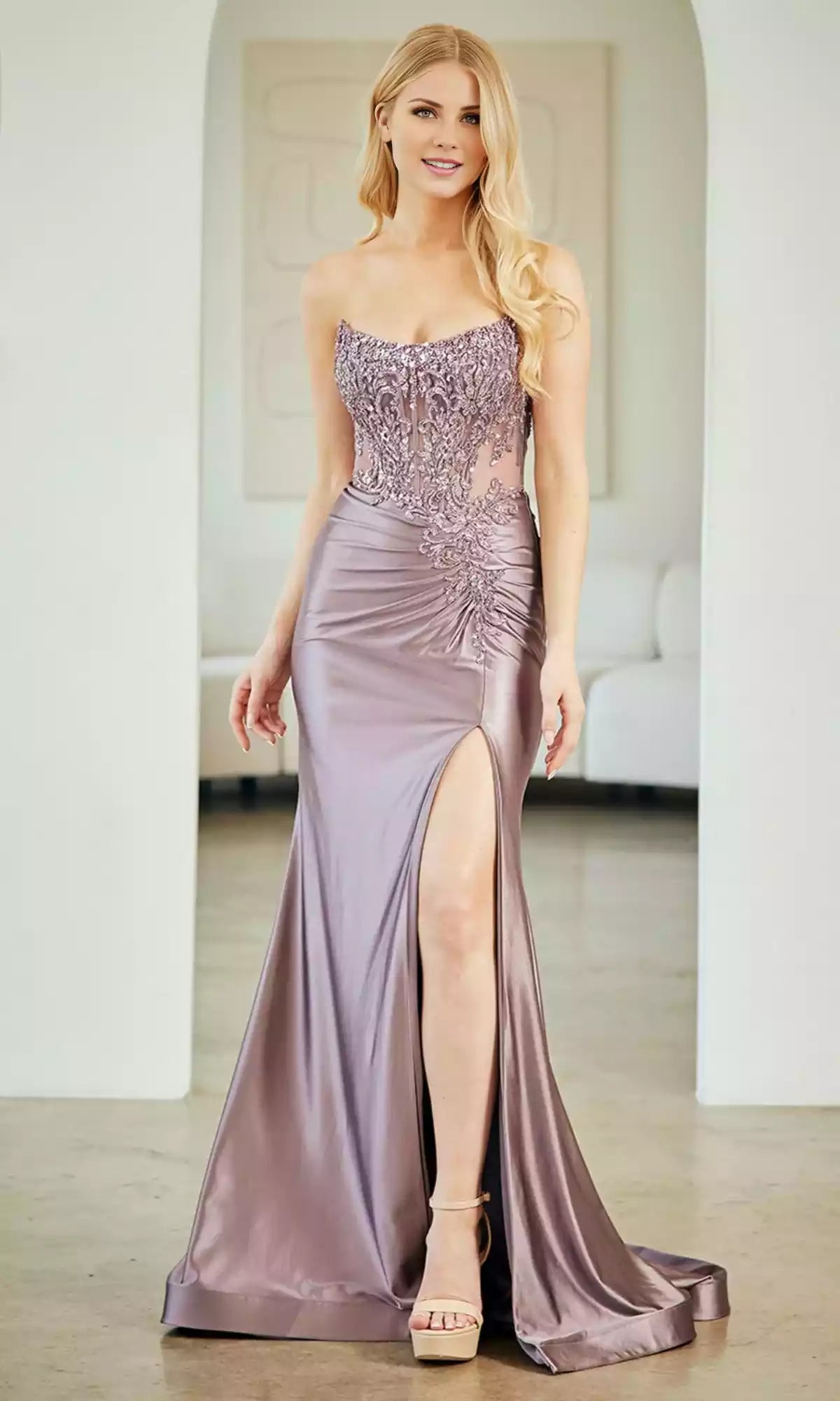 The stunning strapless long sheer corset with tight back straps, high slit, and small tail adds elegance to the Prom Dresses