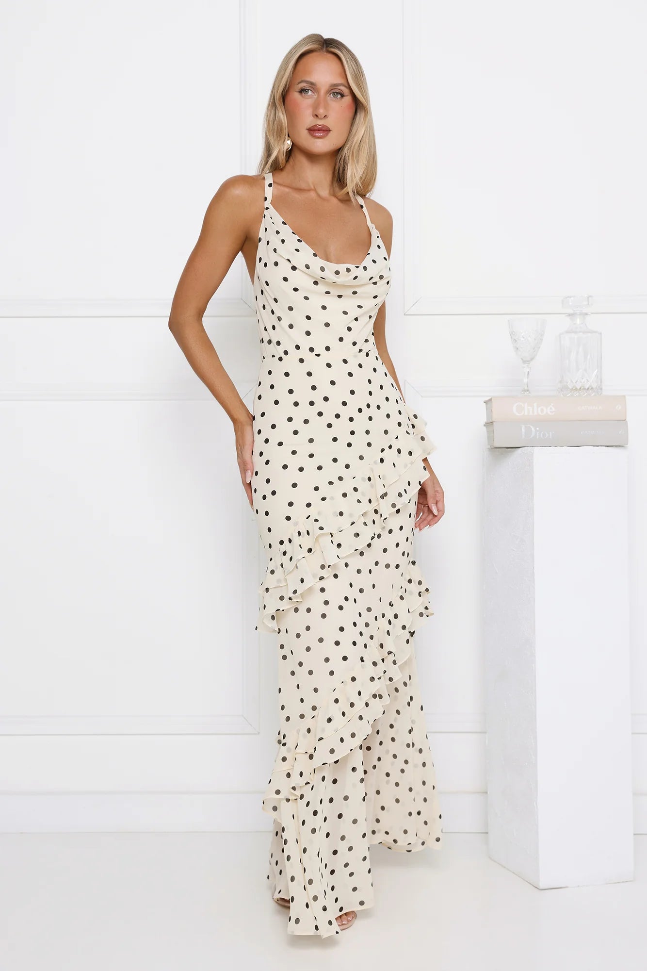 Timeless Cream Polka Dot Maxi Dress with Cowl Neckline, Asymmetric Ruffle Trim, Crisscross Back Straps and Flowy Chiffon Fabric