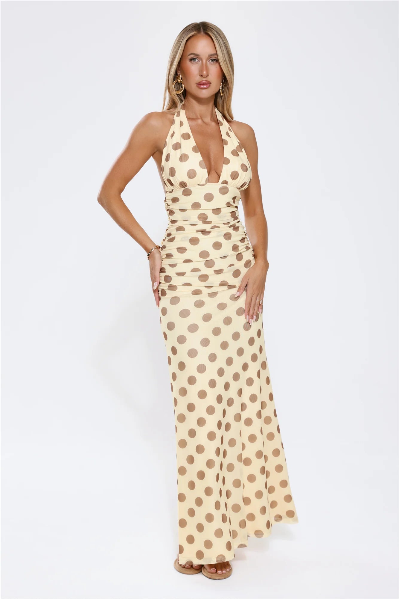 Vintage Cream Polka Dot Halter Maxi Dress with Deep V-Neckline, Ruched Waist Detail, Open Back Tie Closure and Flowing Floor-Length Skirt