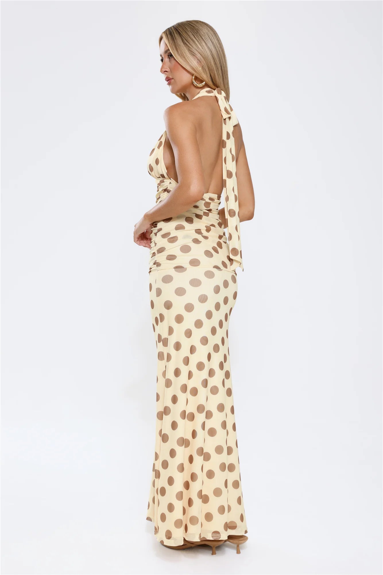 Vintage Cream Polka Dot Halter Maxi Dress with Deep V-Neckline, Ruched Waist Detail, Open Back Tie Closure and Flowing Floor-Length Skirt