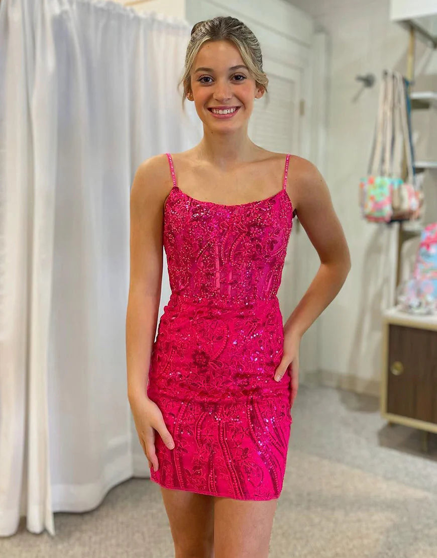 A school gown with a spaghetti strap fishbone tight corset and sparkling back