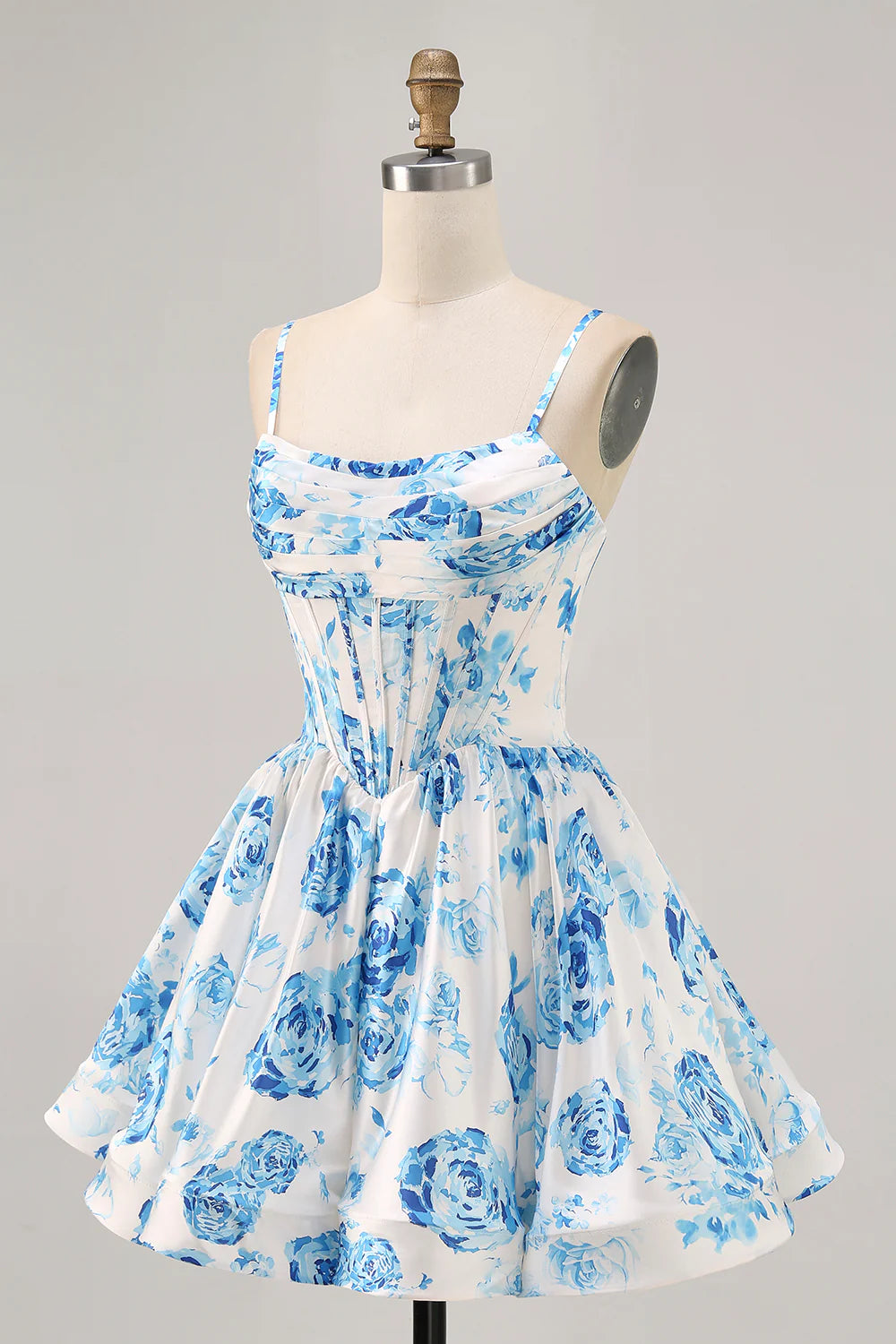 Side view of white and blue floral A-line homecoming dress.