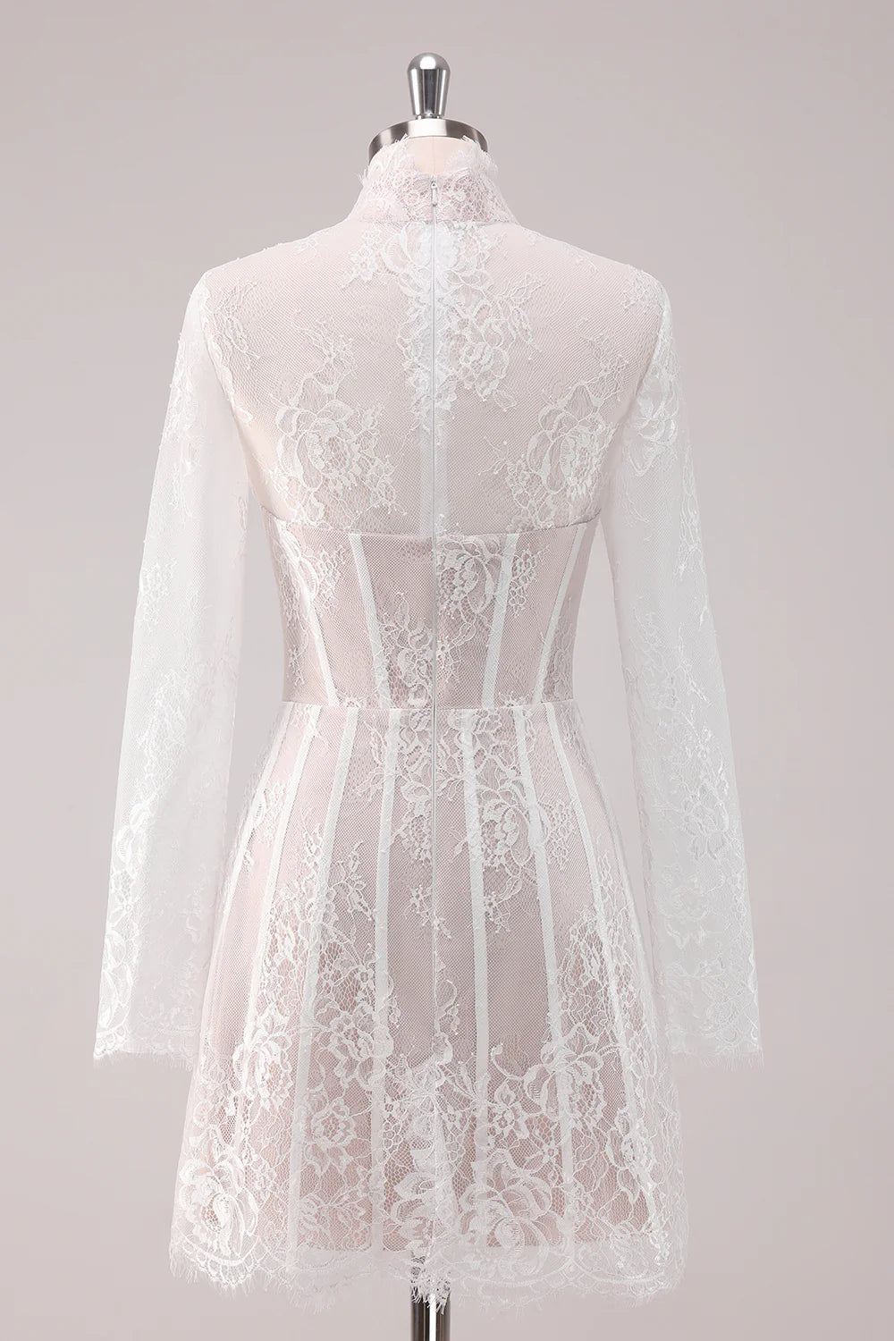 Side view of a model in a white lace A-line high neck long sleeve short homecoming dress.