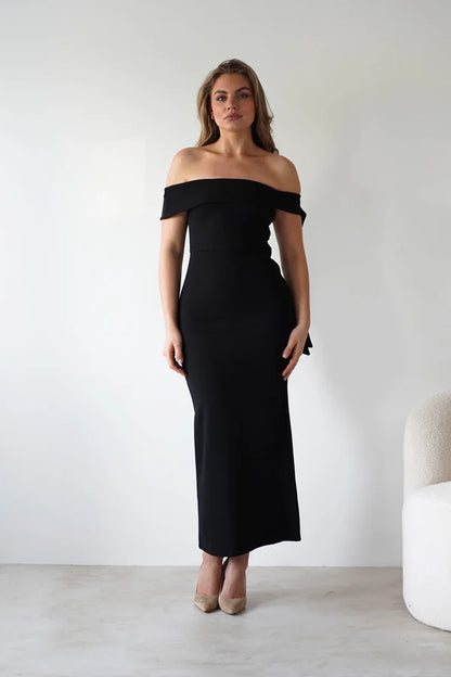 Sleeveless tight fitting waist cinching dress