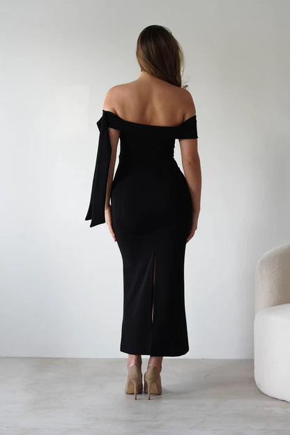 Sleeveless tight fitting waist cinching dress