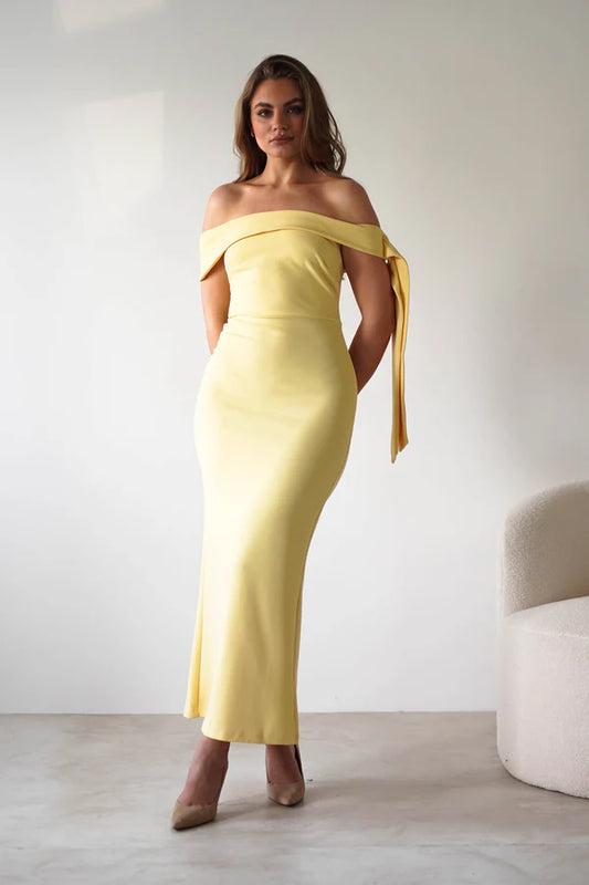 Sleeveless tight fitting waist cinching dress