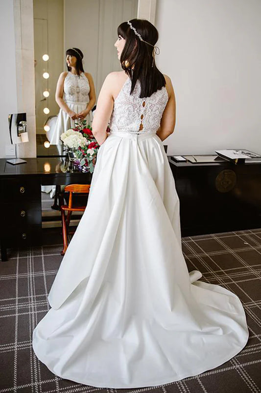Sleeveless hanging neck lace wedding dress with decals