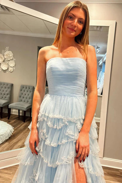 Strapless sleeveless pleated hem waist cinching side slit ballroom dress