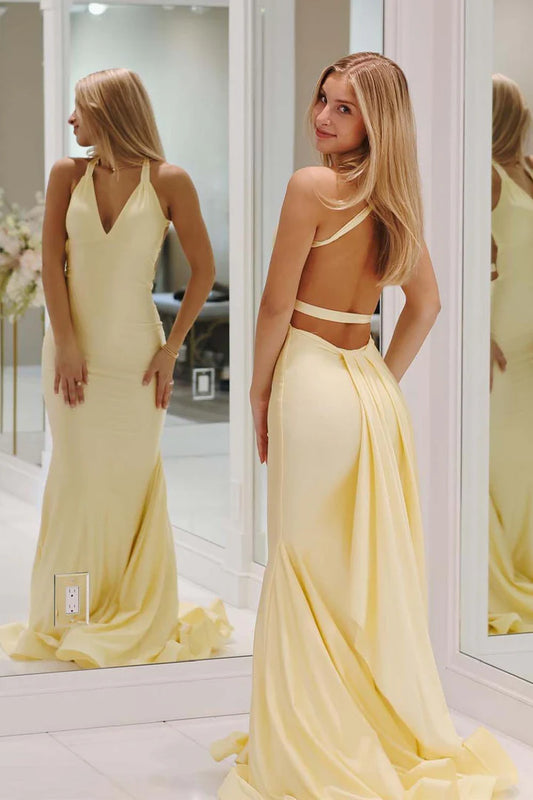 Unique backless ball gown with camisole and deep V-floor skirt