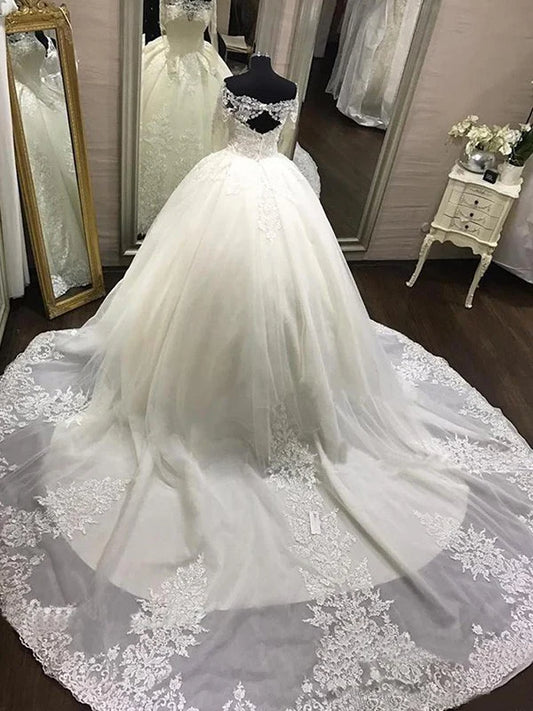 Off shoulder long sleeved backless lace wedding dress