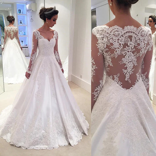 Unique and elegant V-neck long sleeved ball gown with lace ribbon decal wedding dress
