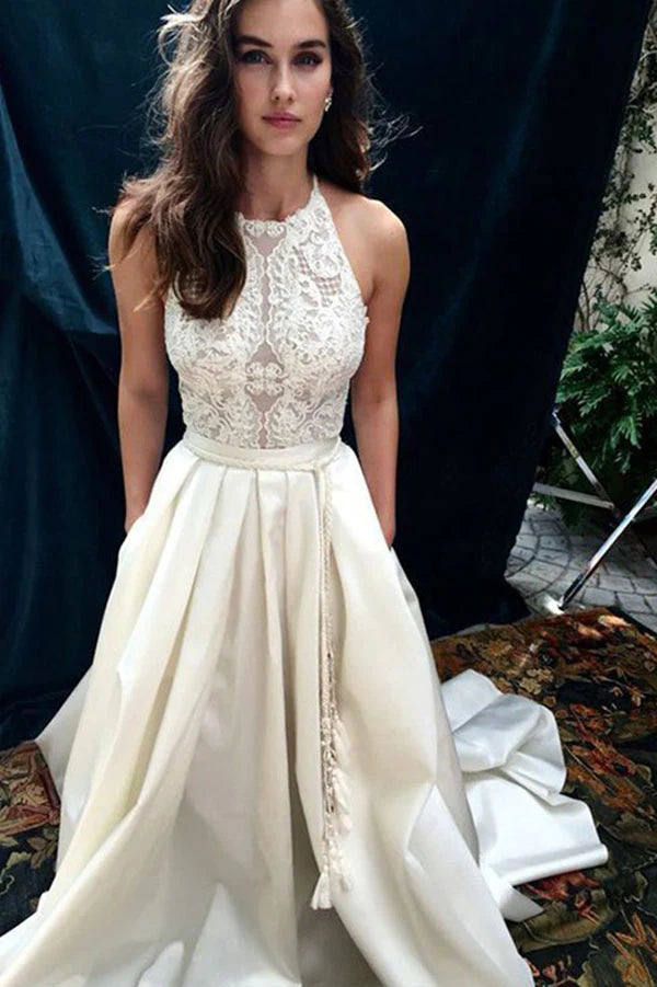 Sleeveless hanging neck lace wedding dress with decals