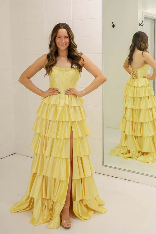 Yellow strapless ruffled side slit ball gown