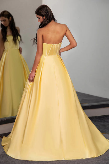 Yellow sleeveless strapless fishbone corset ball gown