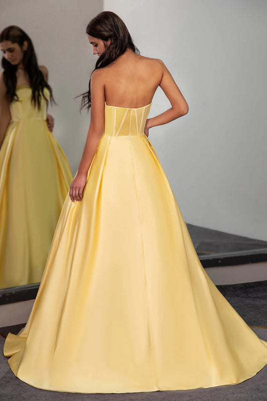 Yellow sleeveless strapless fishbone corset ball gown