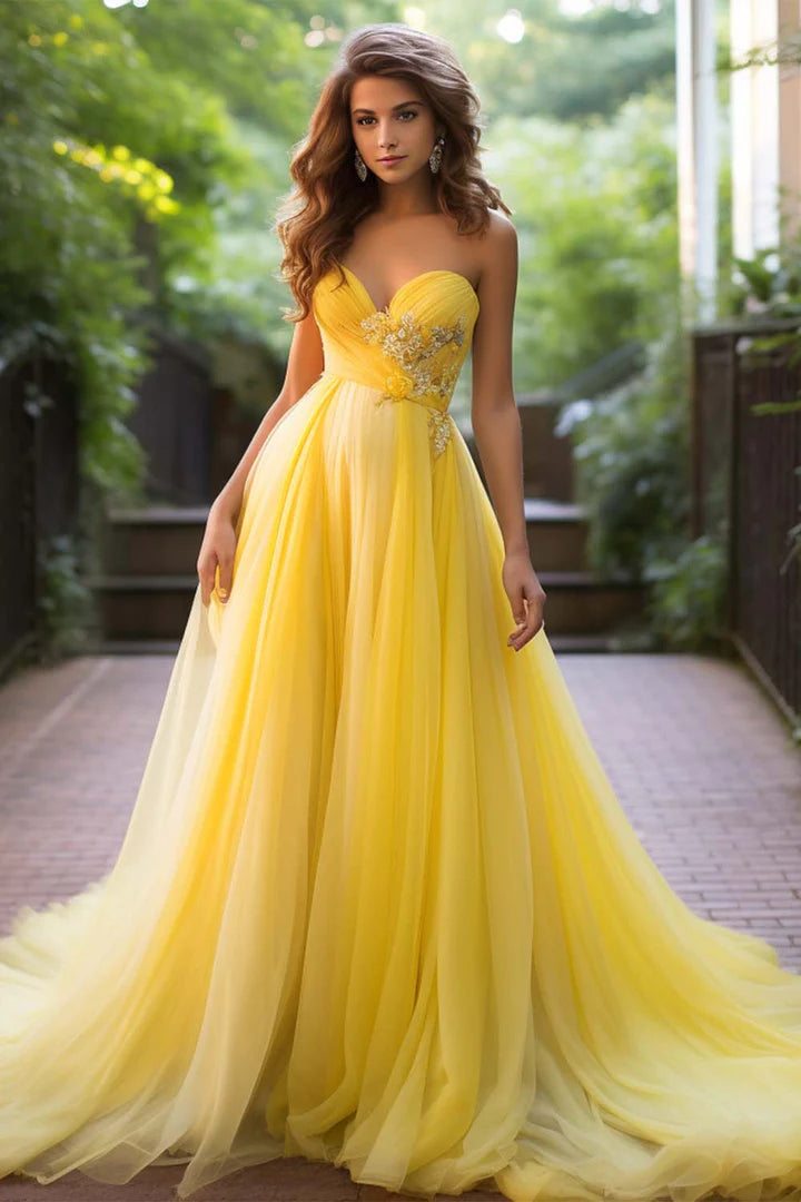 Yellow strapless strapless embroidered chiffon ball gown